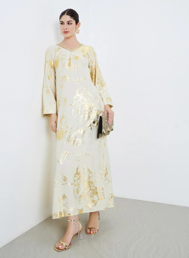 أميرة جلابية بتفاصيل شرابات وطبعة زهور